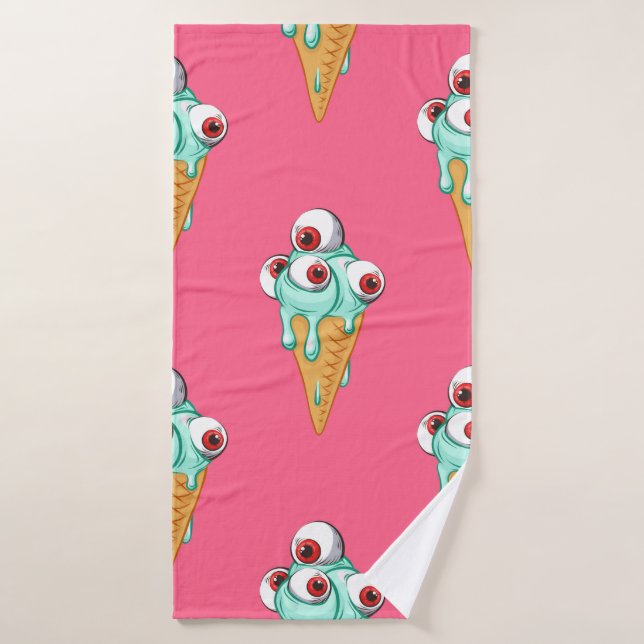 Crème glacée bleue aux yeux. Arrière - plan rose.  (Serviette de bain)