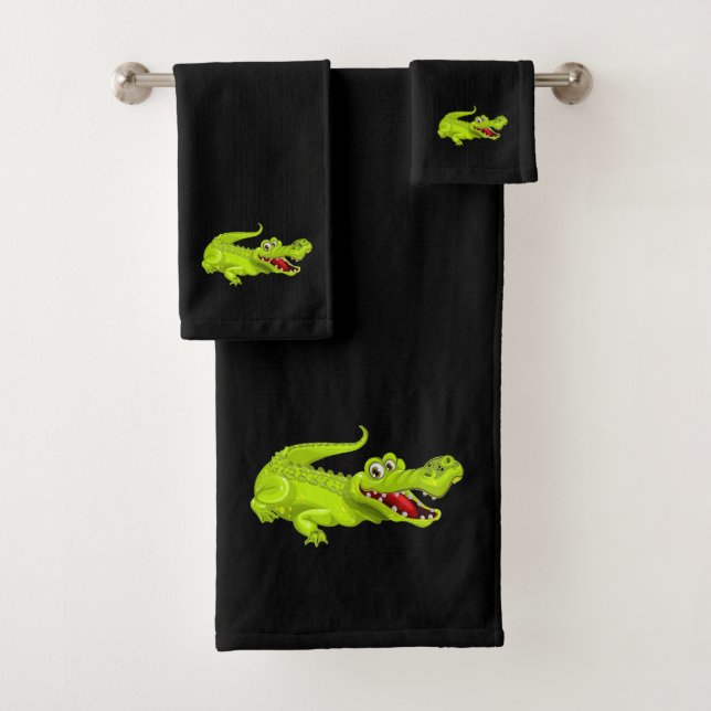 Crocodile mignon sur serviette de bain noire (En situation)