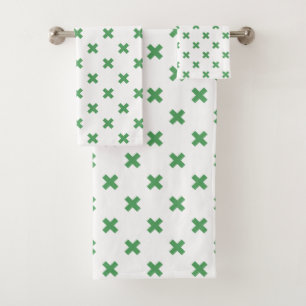 Croix verte coutures sur blanc
