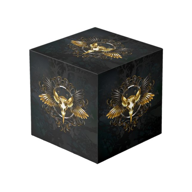 Cube Photo Crâne d'oiseau doré sur fond noir (Angle devant)