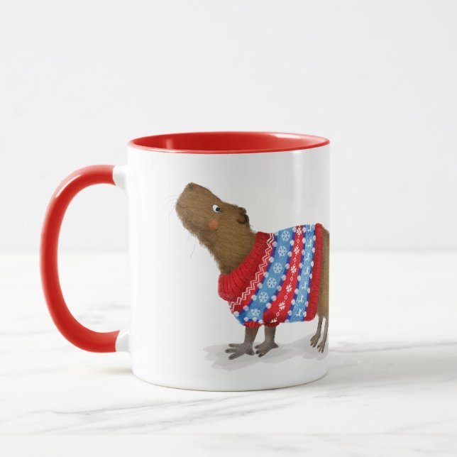 Cute capybara dans une tasse à sauter de Noël (Gauche)
