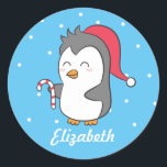 Cute Christmas Penguin Candy Cane Name Stickers<br><div class="desc">A cute penguin design for the little ones. It has a cartoon of a cute and happy penguin holding on to a candy cane and wearing a Christmas cap. Put a smile on your little one's face with this delightful design. Personalise with child's name.</div>
