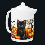 Cute Citrouille d'Halloween et théière de fêtes de<br><div class="desc">Décorez votre cuisine pour la saison d'Halloween avec ce chat noir et cette théière citrouille. Utilisez cette théière pour une brasse de vacances ou retirez le couvercle et remplissez-la de fleurs de saison. Cette théière a été créée à partir d'une image générée par l'IA.</div>