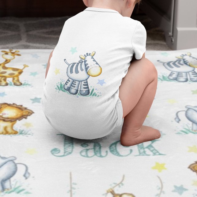 Cute couverture bébé jungle (Baby on a fleece jungle blanket)