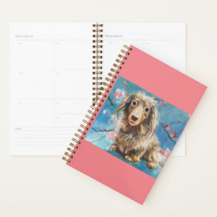 Dachshund à long Haired dans le planificateur de f