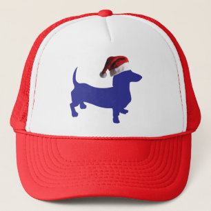 Dachshund bleu portant un Casquette du Père Noël