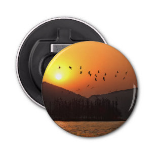 Décapsuleur Birds Flying dans le lac Est de Sunset Sky