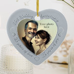 Décoration En Céramique 25th Wedding Anniversary Photo<br><div class="desc">Celebrate 25 years of marriage with a special custom photo ornament in a delightful heart shape frame. Simply upload your own photo of the married couple and it will appear in the cutout. The silver-gray surround features a script font and decorations. (Please note that no actual metallic or shiny ink...</div>