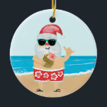 Décoration En Céramique Aloha Hawaiian Père Noël Tropical Beach Noël<br><div class="desc">L'ornement de Noël est orné d'un Père Noël mignon sur une plage tropicale portant des shorts en papier hawaïen rouge et blanc avec un motif hibiscus,  sirotant un ananas et clignotant l'Aloha. Image originale KL Stock</div>