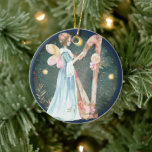 Décoration En Céramique Angelic Winter Music Jouer Angel<br><div class="desc">Apportez une touche gracieuse d'élégance angélique avec ce bel ange jouant de la harpe. Des neiges tombantes avec des étoiles brillantes sont présentées dans l'arrière - plan. Faites glisser dans mon magasin pour d'autres modèles spéciaux.Merci</div>