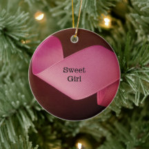 Bébé fille premier ruban rose de Noël twirling