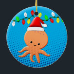 Décoration En Céramique Cartoon mignon Octopus Santa Hat lumières de Noël<br><div class="desc">Un mignon poulpe orange. Des ornements pour bébés animaux. Version casquette du Père Noël avec lumières de Noël dans l'arrière - plan. Idée cadeau pour les enfants.</div>