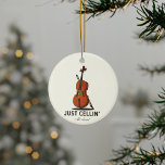 Décoration En Céramique Cellist Performance Music Cello Custom Just Cellin<br><div class="desc">Cet ornement de Noël "Juste Cellin" fait un grand cadeau pour un violoncelliste ou comme un régal pour vous-même pour les moments où vous êtes juste au frais ou pour toute occasion spéciale. Ajoutez un nom ou une année de vacances en utilisant notre bouton "Personnalisé" ci-dessus</div>