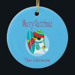 Décoration En Céramique Cool Snowman Christmas Surfer<br><div class="desc">A cool Christmas ceramic ornament,  this design features a beautiful blue background with a snowman holding a surfboard.  A great gift for the surfer,  personalize yours today!

Snowman Prettygrafik design  (https://www.etsy.com/shop/Prettygrafikdesign)</div>
