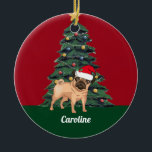 Décoration En Céramique Cute Christmas Pug in Santa Hat Personalized Red<br><div class="desc">This beautiful monogrammed Christmas ornament features a cute pug wearing a Santa Claus hat in front of a pretty Christmas tree decorated with colorful ornaments. Personalize with a pet owner name in lovely cursive under the wonderful drawing.</div>
