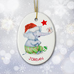 Décoration En Céramique Cute Elephant Star Personnalisé<br><div class="desc">Ce joli ornement pour enfants de Noël est orné d'un adorable éléphant gris aquarelle qui porte des fonds de pyjama rayés verts et rouges et un chapeau de Père Noël rouge. Il offre un cadeau attaché avec un ruban rouge. Une étoile rouge brille au-dessus de lui, et une ampoule verte...</div>