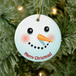 Décoration En Céramique Drôle Visage Snowman avec Carotte Nez Cartographié<br><div class="desc">Cet ornement drôle avec un visage de bonhomme de neige avec le nez de carotte et les joues roses peut être entièrement customisé de part et d'autre avec vos propres messages. Remplacez le texte (illustré ici par "Joyeux Noël !" et "Joyeuses fêtes !") et créez un ornement de type "nature",...</div>