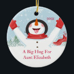 Décoration En Céramique Étreinte pour tante Christmas Snowman Ornament<br><div class="desc">Mignon une grande étreinte pour l'ornement de Noël de bonhomme de neige de tante.  Facile à personnaliser avec votre message !  Un cadeau de tante Noël de merveille sure à priser depuis de nombreuses années pour venir.</div>