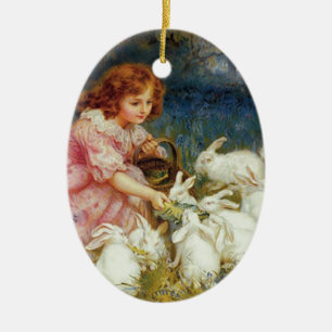 Décoration En Céramique Fille nourrissant des lapins
