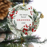 Décoration En Céramique Grand-mère la plus aimée jamais Festive Wreath Noë<br><div class="desc">Faites savoir à grand-mère combien elle est aimée en cette période de fêtes avec cette belle couronne botanique d'aquarelle festive ornée de feuillage d'hiver et d'ornement de Noël de baies rouges. Le texte dit - la GRANDA la plus aimée jamais avec l'option d'ajouter des noms de petits-enfants à l'inverse. Un...</div>