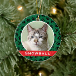 Décoration En Céramique Green Pet Paw Prints Personalized Cat Name Photo<br><div class="desc">This festive custom holiday ornament can be personalized with a cute photo of your pet cat (or dog) and their first name. Includes a green background color with a red monogram stripe and black paw print pattern. Makes a unique Christmas gift for cat lovers or to celebrate kitty's first Christmas!...</div>