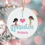 Décoration En Céramique I Love Gymnastique mignonne Africaine Américaine<br><div class="desc">Ce joli cadeau de décoration de Noël I Love Gymnastique présente une petite fille noire et un enfant hispanique qui se dégrade sur les lettres. Un magnifique dessin d'une gymnaste afro-américaine.</div>