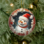 Décoration En Céramique Jolly Snowman Santa Hat - 3D<br><div class="desc">Ajoutez une touche de fantaisie à votre sapin de Noël avec notre adorable ornement Jolly Snowman Santa Hat ! Cette décoration de vacances artisanale est composée d'un bonhomme de neige gai qui regarde à travers un mur de briques rustiques, répandant la joie des vacances partout où il est accroché. Ce...</div>
