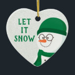Décoration En Céramique Laisser neiger mignon Beanie Snowman<br><div class="desc">Célébrez la saison de Noël avec ce mignon bonhomme de neige portant une belle. Toute votre beanie portant famille et amis adorera cet ornement de Noël. Modifiez le message ou vous pouvez ajouter un nom.</div>
