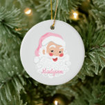Décoration En Céramique Le Père Noël en Casquette rose Noël<br><div class="desc">Cette décoration de Noël est prête à être personnalisée avec votre propre nom et un message supplémentaire à l'envers. Il présente une illustration de style vintage d'un visage de Père Noël joyeux portant un chapeau de Père Noël rose dressé contre un arrière - plan gris clair.</div>