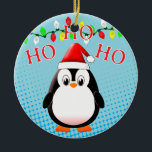 Décoration En Céramique Lumières de Noël du mignon Penguin Santa Hat<br><div class="desc">Un joli dessin de manchot noir et blanc. Ho,  ho,  ho ! Des ornements de céramique pour bébé animal. Version casquette du Père Noël avec lumières de Noël dans l'arrière - plan. Idée cadeau pour les enfants.</div>