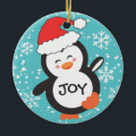Décoration En Céramique Noël de la fête des pingouins dansants<br><div class="desc">Le joli décor de Noël à thème animal de l'Arctique est orné d'un pingouin dansant dans un chapeau de Santa,  avec "Joy" dans le ventre,  sur un arrière - plan de flocons de neige d'hiver et de ciel bleu. Stock original KL.</div>