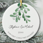 Décoration En Céramique Notre premier Mistletoe engagé pour Noël<br><div class="desc">Célébrez votre premier Noël en couple engagé avec cet ornement en céramique élégant. Il est décoré avec de l'aquarelle et de la typographie de script élégante. Facile à personnaliser. Utilisez l'outil de conception pour modifier la taille,  le style ou la couleur du texte. Aquarelle originale © Michele Davies.</div>