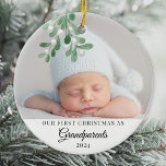 Décoration En Céramique Notre Premier Noël En Tant Que Grand-Parents Photo<br><div class="desc">Le premier ornement de Noël de ce mignon grand-parent est décoré d'un tatouage à l'aquarelle. Facilement personnalisable avec la photo, le nom et l'année de votre bébé. Utilisez l'outil de conception pour modifier la taille, le style ou la couleur du texte. Parce que nous créons notre oeuvre, vous ne trouverez...</div>