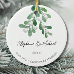 Décoration En Céramique Notre premier Noël marié<br><div class="desc">Célébrez votre premier Noël en couple engagé avec cet ornement en céramique élégant. Il est décoré avec de l'aquarelle et de la typographie de script élégante. Facile à personnaliser. Utilisez l'outil de conception pour modifier la taille,  le style ou la couleur du texte. Aquarelle originale © Michele Davies.</div>