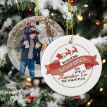 Décoration En Céramique Père Noël Photo Noël Personnalisé<br><div class="desc">Ce design présente un ornement photo de Noël vintage, avec le pôle Nord, le Père Noël, et un renne mignon, parfait pour une photo de famille, avec un décor festif de vacances, un thème de balade en traîneau, et un script de typographie rétro, en rouge et blanc, un signe classique...</div>