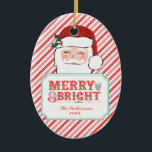 Décoration En Céramique Père Noël rose et rouge | Joyeux et lumineux<br><div class="desc">Cet ornement de Noël présente un design Père Noël gai avec un texte qui dit "Joyeux & Lumineux." Vous pouvez personnaliser avec votre nom et année en bas. Sur le dos se trouve un autre motif de coordination en diagonale rose et rouge.</div>