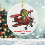 Décoration En Céramique Personnalisé, Joli dinosaure d'avion, 1er Noël<br><div class="desc">Design présente un dinosaure mignon avec un casque de pilote volant d'un avion rouge. Au bas de l'image se trouve le texte "[Nom] 1er Noël" et l'année. Customisez cette décoration avec vos détails spécifiques. Ce serait parfait pour ce petit aviateur ! Copyright Soar In Style Designs LLC.</div>