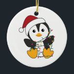 Décoration En Céramique Pingouin Christmas Snow Winter Animals Pingouins<br><div class="desc">Le pingouin pour Noël avec des lumières de fées. Animaux amusants avec des cadeaux et de la neige pour les vacances. Aussi drôle pour Noël en juillet. Les pingouins sont des animaux mignons et parfaits pour Noël.</div>
