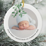 Décoration En Céramique Premier Noël en tant que parents photo aquarelle<br><div class="desc">Le premier ornement de Noël de ce Parent est décoré d'un tatouage à l'aquarelle. Facilement personnalisable avec la photo, le nom et l'année de votre bébé. Utilisez l'outil de conception pour modifier la taille, le style ou la couleur du texte. Parce que nous créons notre oeuvre, vous ne trouverez pas...</div>