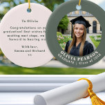 Décoration En Céramique Sage Green Modern Photo Graduation Keepsake<br><div class="desc">Celebrate your graduate's success with this elegant, modern graduation photo ornament. The front features a sophisticated sage green border framing your chosen photo, with customizable curved text for the graduate's name and class year. The reverse side features a complementary pale pink background with space for your own personalized, heartfelt message...</div>