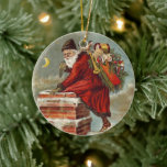 Décoration En Céramique Saint Nicolas victorien de Noël sur le toit<br><div class="desc">Illustration vintage Conception de Noël de l'époque victorienne avec Saint Nicolas sur une escalade sur le toit,  sur une cheminée recouverte de neige avec un sac plein de jouets le soir de Noël.</div>