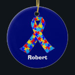 Décoration En Céramique Sensibilisation sur l'autisme personnalisée Ruban<br><div class="desc">Belle Sensibilisation sur l'autisme personnalisée ornement de Noël pour amis autistes ou famille. Un cadeau de père ou de mère autiste cool qui peut être personnalisé avec n'importe quel texte sous le ruban de la pièce de puzzle de bleu,  jaune et rouge. Un joli syndrome d'Asperger est présent.</div>