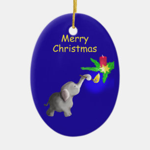 Décoration En Céramique Un petit éléphant éclaire un Noël aux bougies