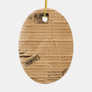Décoration En Céramique Vieux carton Brown endommagé avec des timbres et