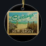 Décoration En Céramique Vintage voyage de l'ornement du New Jersey Beach<br><div class="desc">Ce design de carte postale vintage du New Jersey présente une plage de sable avec une belle eau turquoise de l'océan et au-dessus de la mer,  un ciel bleu avec des nuages blancs lustrés. Dans un style de voyage vintage.</div>