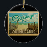 Décoration En Céramique Vintage voyage de plage de Banks<br><div class="desc">Ce design de carte postale vintage Greutings From Outer Banks comprend une plage de sable avec une belle eau turquoise de l'océan et au-dessus de la mer,  un ciel bleu avec des nuages blancs lustrés. Dans un style de voyage vintage.</div>