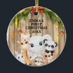 Décoration En Céramique Woodland Animals Baby's First Christmas Ornament<br><div class="desc">Woodland Animals Baby's First Christmas Ornament
Baby's first christmas decor features cute little Bear,  giraffe,  sloth,  elephant,  rabbit,  wild cat and panda against a backdrop of rustic woods. Personalize your child's information and history and you are ready to start! A great dated souvenir for your child's first christmas.</div>