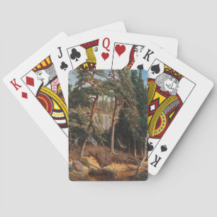 Des cartes à jouer dans la forêt