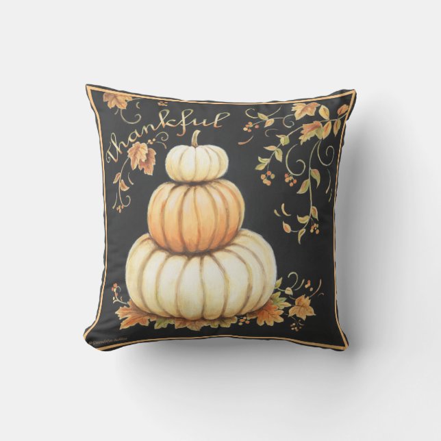 Des citrouilles chauds avec un coussin noir "Génia (Recto)
