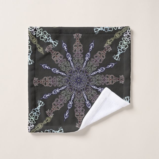 Des flocons de neige ouvrés sur le noir. (Gant de toilette)
